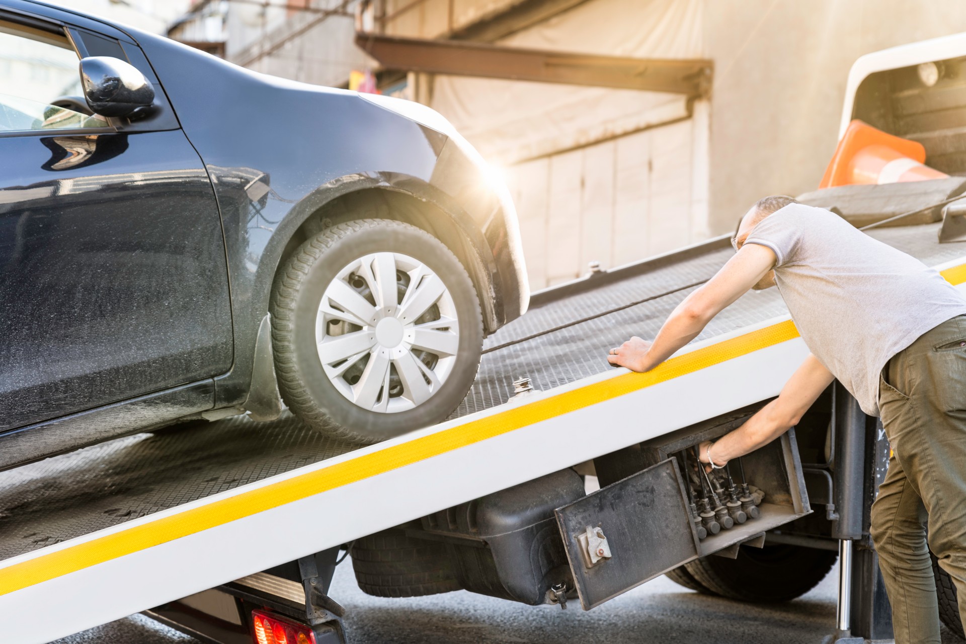 Car Loaded Onto A Recovery Truck For Transportation